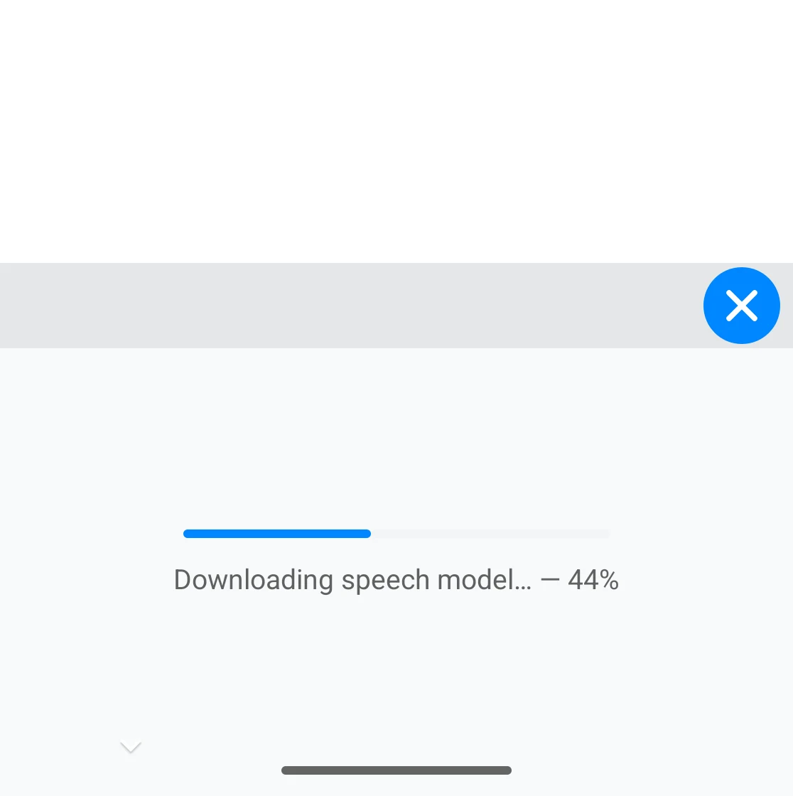 The keyboard downloading the speech model on first use